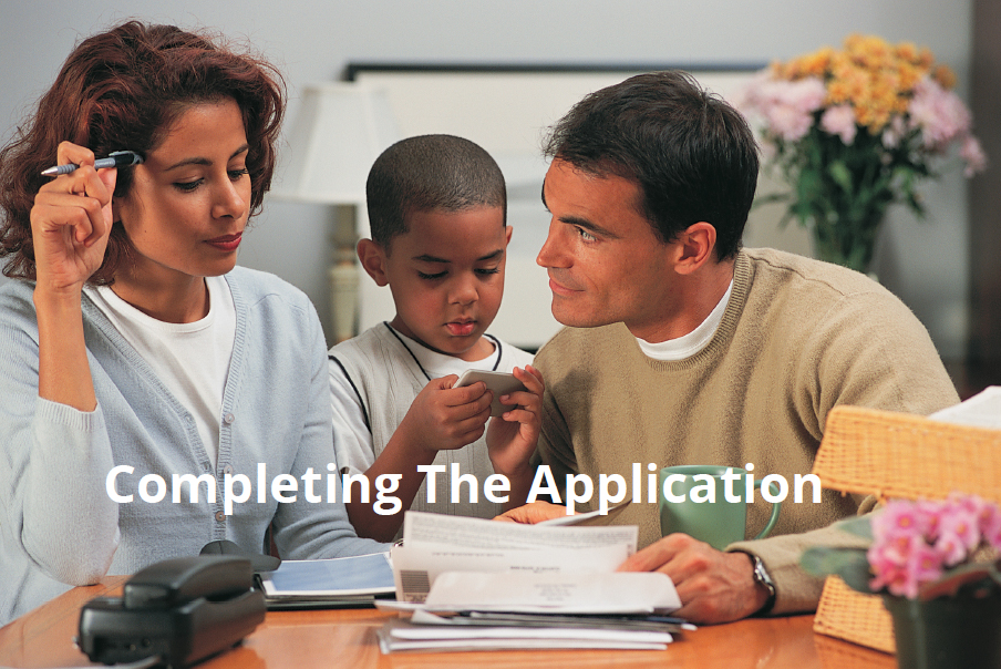 Family completing the application.